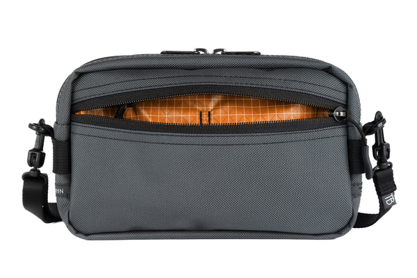 A Side Effect in Nebulous Grey (medium grey) Ballistic with Zest (orange with white grid) 200 Halcyon interior.
